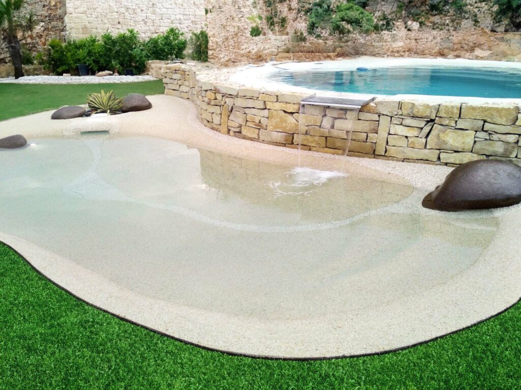 Une piscine lagon réalisée par Lagoon Piscines